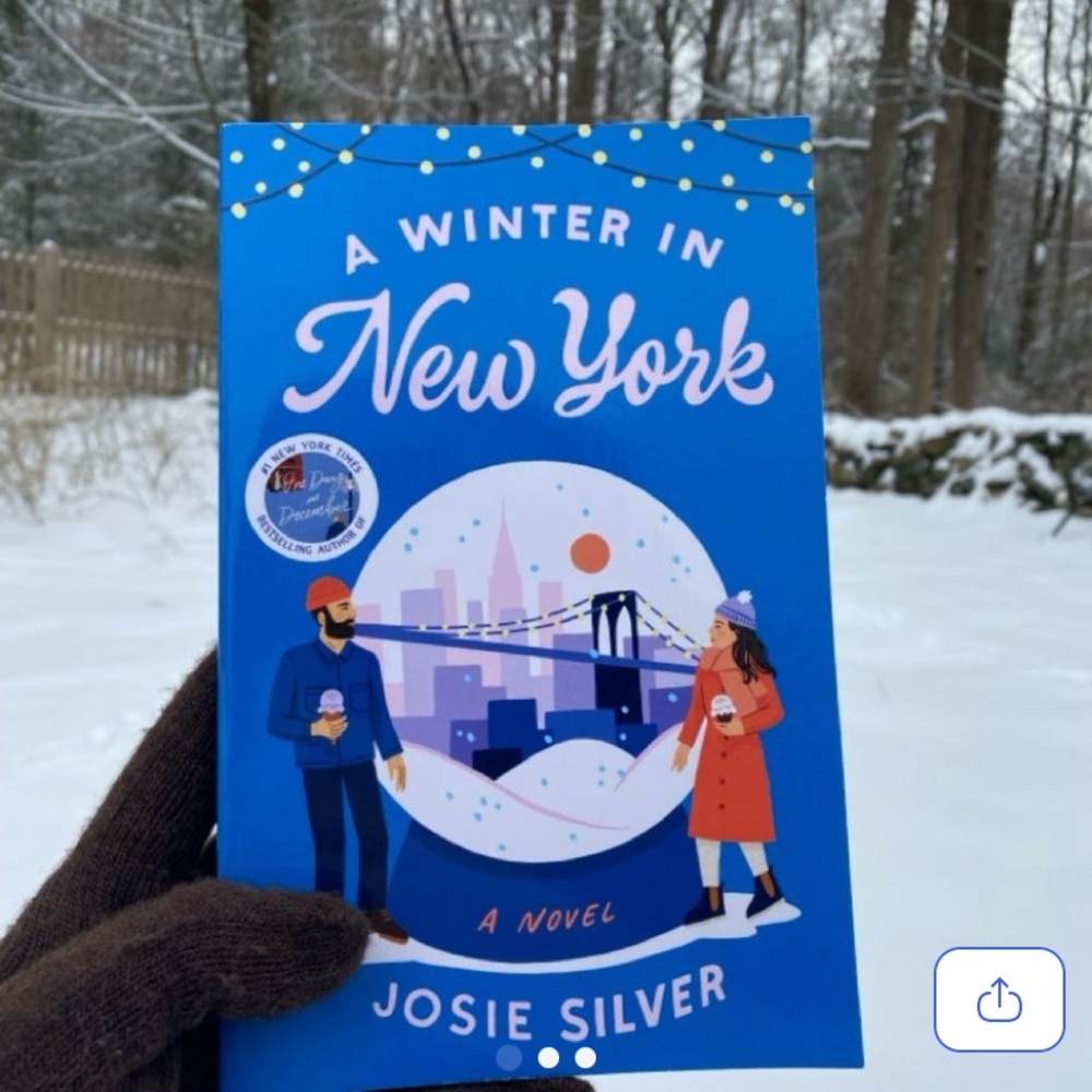 Paperback copy of A Winter in New York by Josie Silver.
